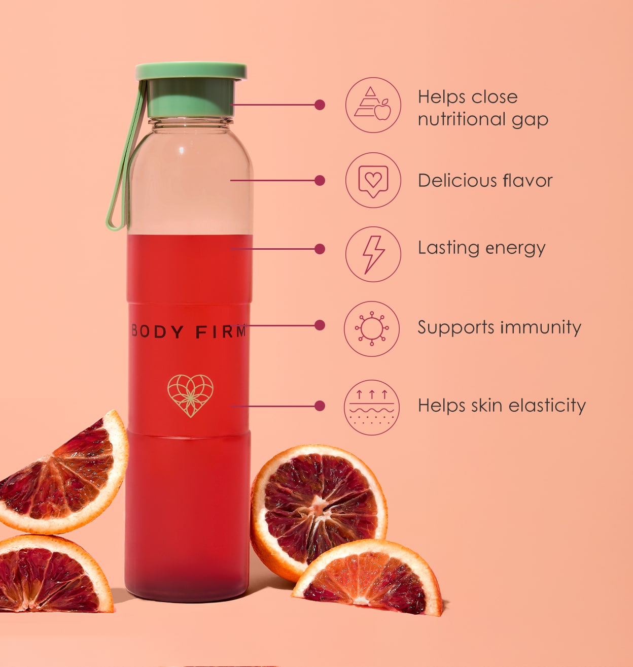 Bottle of red juice labeled 'BODY FIRM' with sliced oranges on a pink background